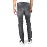 Black button fly closure jeans with pockets and logo details